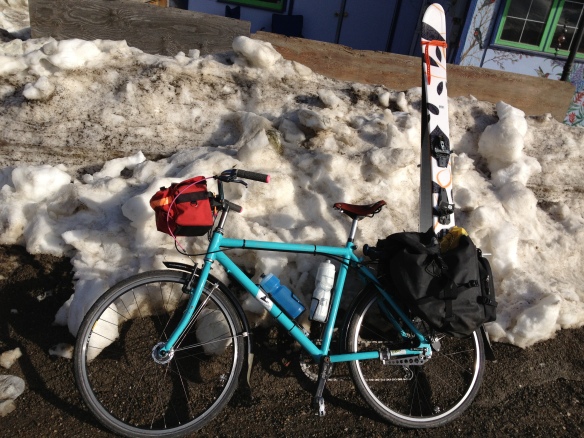All loaded up with skis, boots (one in each pannier), and poles!
