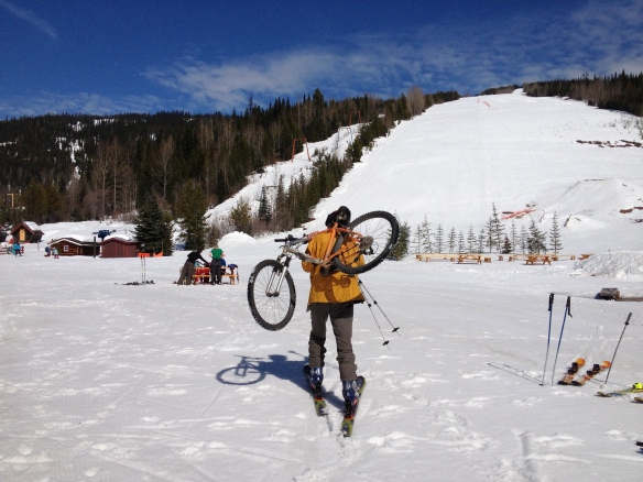 Dave about to try biking with skis on. He quit BEFORE he seriously injured his crotch - smart man.